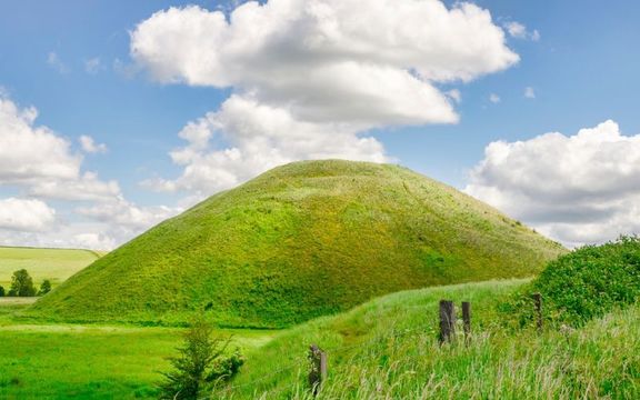 Silbury Hill, the prehistoric artificial chalk mound near Avebury in the England, Wiltshire, a UNESCO World Heritage Site.