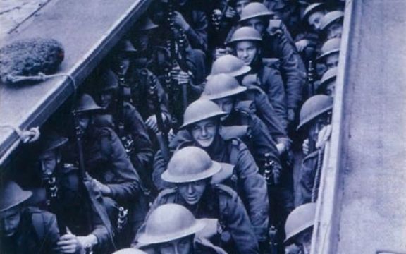 Ranks of Royal Marines train aboard a landing craft in preparation for the D-Day assault.[