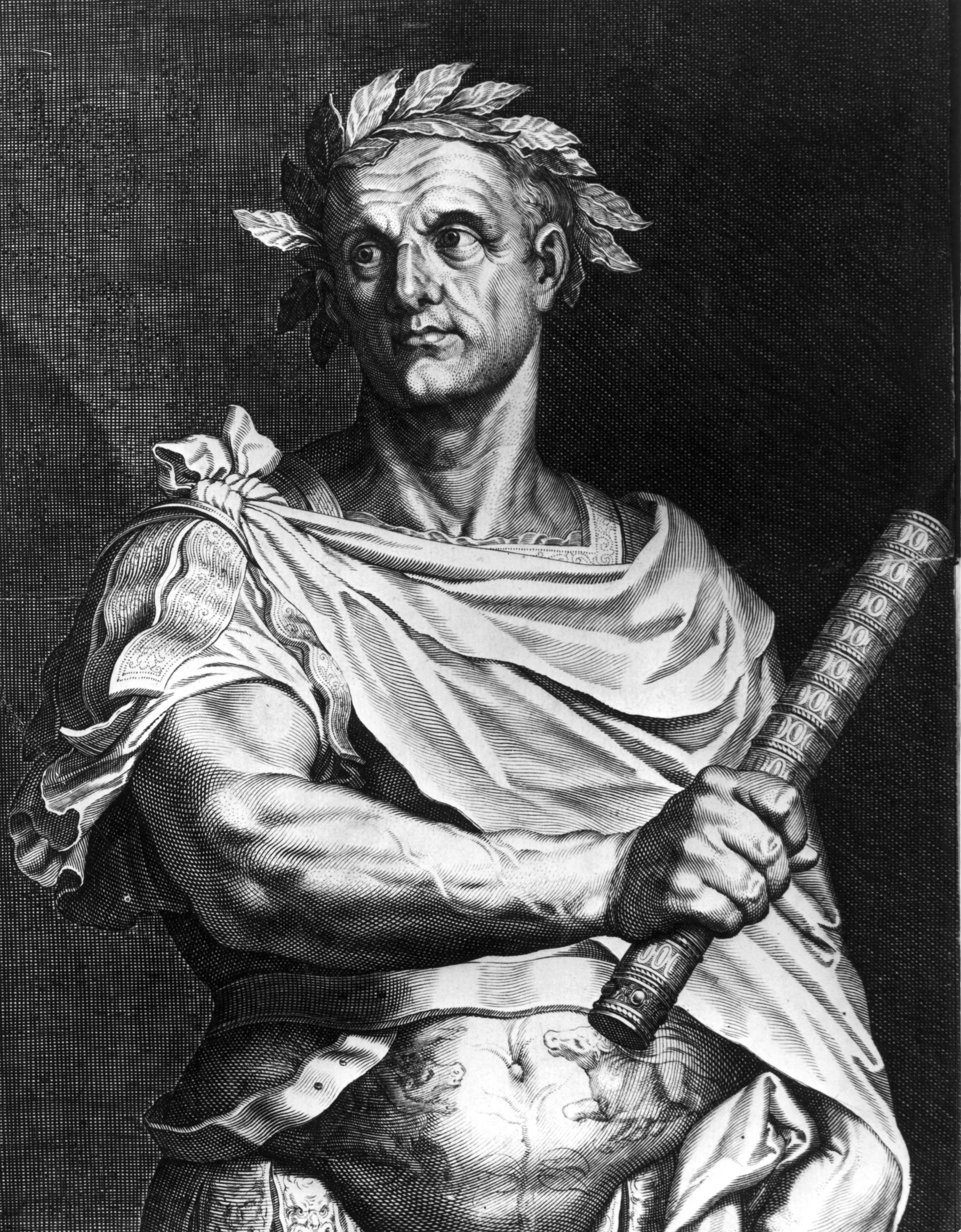 Circa 50 BC, Julius Caesar (102 BC - 44 BC) as dictator of Rome wearing a crown of laurel and holding a symbol of office