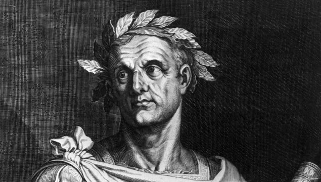 Circa 50 BC, Julius Caesar (102 BC - 44 BC) as dictator of Rome wearing a crown of laurel and holding a symbol of office