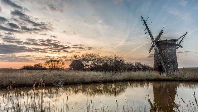 The Fens: Brograve mill at sunset in Norfolk.