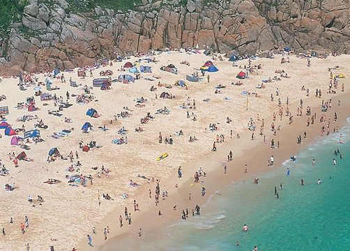Like many of the tiny cove beaches along the Penwith coast, the fine sands and azure waters of the beach at Porthcurno give a Mediterranean flavor to southern Cornwall.