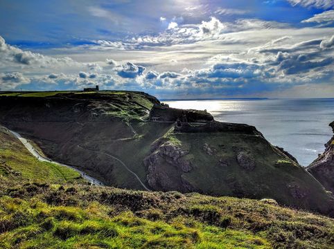 Tintagel Castle perched precariously in the mists of history on the Cornish clifftop.