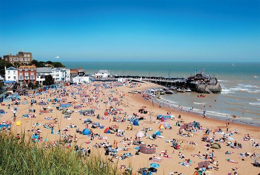 Broadstairs’ Viking Bay has been a haven for summer sun-seekers for generations. The fortress-like house on the rise behind was Charles Dickens’ residence, long known as Bleak House.