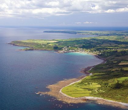 This aerial view of the Lizard looks south past Coverack toward Black Head and Lizard Point.