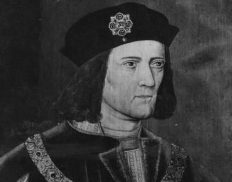 Circa 1480, King Richard III (1452 - 1485) wearing a chain of office and playing with a ring on his little finger. 