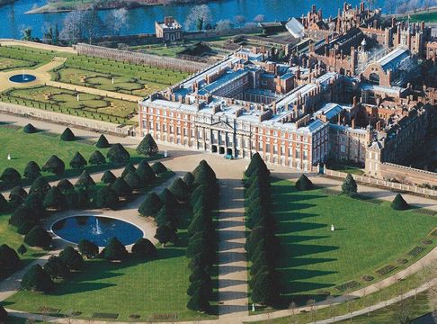 The huge tapered yews of Hampton Court Palace shaped the view from the front windows for King Henry VIII and his court.