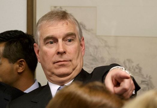 Prince Andrew, Duke of York points his finger as he speaks to business leaders during a reception at the sideline of the World Economic Forum on January 22, 2015 in Davos Switzerland. Prince Andrew has publicly denied allegations he had sex with an underage teenager. He made the denial during a visit to the World Economic Forum in Davos, Switzerland, on Thursday. It was his first public appearance since the charges. (Photo by Michel Euler-WPA Pool/Getty Imaes)