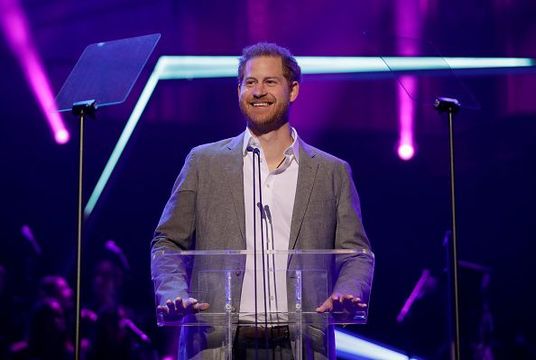 Britain\'s Prince Harry gives a speech on stage before announcing the winners of the Health and Wellbeing category at the inaugural OnSide Awards at the Royal Albert Hall on November 17, 2019 in London, United Kingdom. (Photo by Matt Dunham – WPA Pool/Getty Images)
