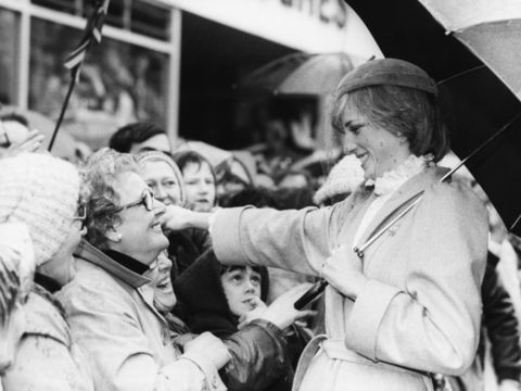 Princess Diana of Wales smiling as she prepares to embrace a woman in the crowd, on the streets of Carmarthen, Wales, October 29th 1981. (Photo by Central Press/Hulton Archive/Getty Images)