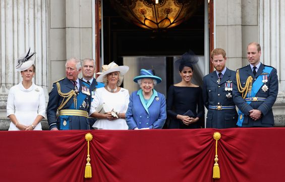 Prince Charles, Prince of Wales, Prince Andrew, Duke of York, Camilla, Duchess of Cornwall, Queen Elizabeth II, Meghan, Duchess of Sussex, Prince Harry, Duke of Sussex, Prince William, Duke of Cambridge and Catherine, Duchess of Cambridge watch the RAF flypast on the balcony of Buckingham Palace, as members of the Royal Family attend events to mark the centenary of the RAF on July 10, 2018 in London, England. (Photo by Chris Jackson/Getty Images)