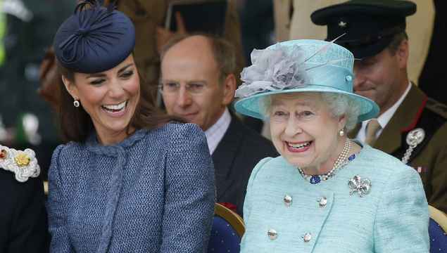 Catherine, Duchess of Cambridge and Queen Elizabeth II watch part of a children\'s sports event while visiting Vernon Park during a Diamond Jubilee visit to Nottingham on June 13, 2012 in Nottingham, England.