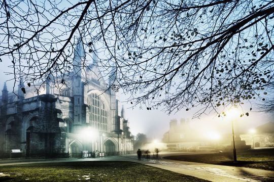 A view of Winchester Cathedral on a winter\'s evening