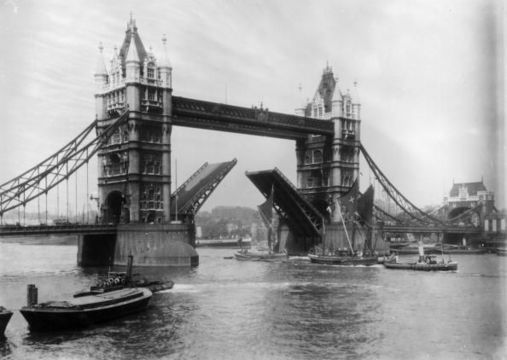Tower Bridge on the River Thames in London, completed in 1894 with central drawbridge raised to allow passing ships. (Photo by Hulton Archive/Getty Images)