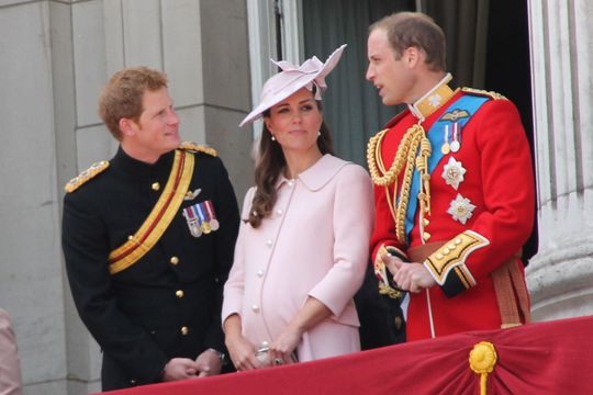 Kate Middleton, aka Catherine, Duchess of Cambridge, photographed between Harry and Prince William in 2013.