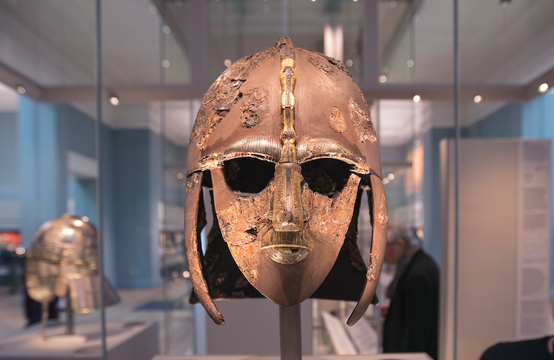 the Sutton Hoo Helmet on display in the new gallery \'Sutton Hoo and Europe AD 300-1100\' in the British Museum on March 25, 2014 in London, England. The exhibition in the museum\'s early medieval collections marks 75 years since the discovery of the Sutton Hoo treasure. The gallery\'s centrepiece are the archelogical finds from the Sutton Hoo ship burial in Suffolk; one of Britain\'s most spectacular and important discoveries.