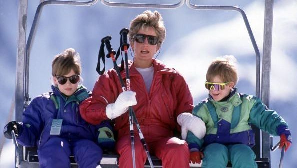 The Princess of Wales with her sons William and Harry on the chair lift during a skiing holiday in Lech, Austria, April 1991. (Photo by Jayne Fincher/Princess Diana Archive/Getty Images)