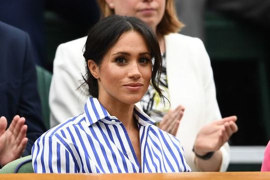 Meghan, Duchess of Sussex attends day twelve of the Wimbledon Lawn Tennis Championships at All England Lawn Tennis and Croquet Club on July 14, 2018 in London, England. (Photo by Clive Mason/Getty Images)