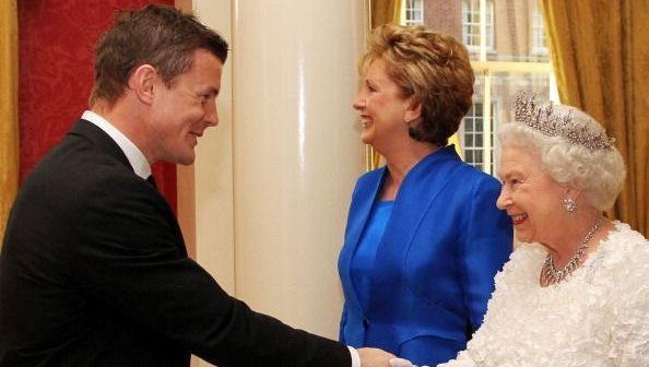 Queen Elizabeth II shakes hands with Brian O\'Driscoll , Irish rugby captain before a State Dinner at Dublin Castle, on May 18, 2011 in Dublin.