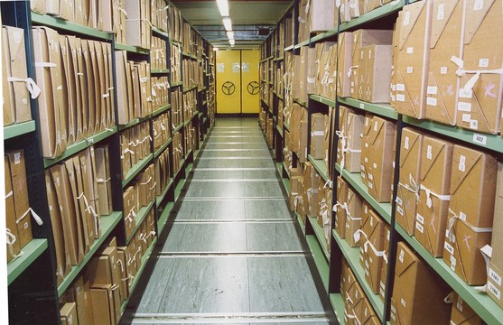 Documents stacked inside the repository at The National Archives, in Kew.