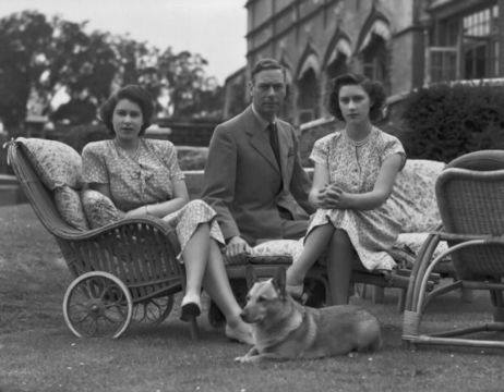 King George VI (1895-1952) with his daughters Princess Elizabeth and Princess Margaret (1930 - 2002) in the grounds of Windsor Castle in Windsor, England on July 08, 1946. (Photo by Lisa Sheridan/Studio Lisa/Getty Images)