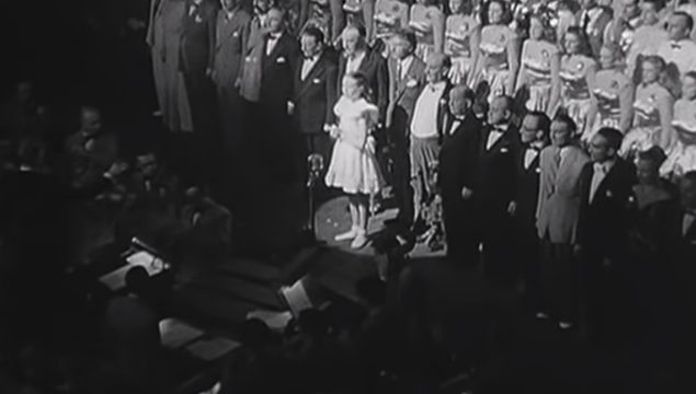 Julie Andrews (13) performs for George VI and Queen Elizabeth, in 1948.