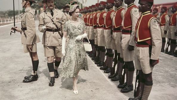 Queen Elizabeth II inspects men of the newly-renamed Queen\'s Own Nigeria Regiment, Royal West African Frontier Force, at Kaduna Airport, Nigeria, during her Commonwealth Tour, 2nd February 1956. (Photo by Fox Photos/Hulton Archive/Getty Images)