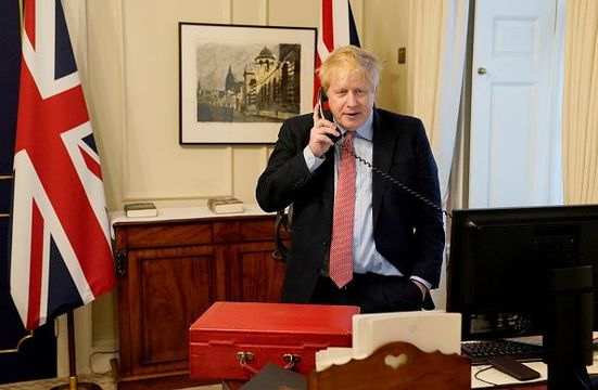 Prime Minister Boris Johnson on the telephone to Queen Elizabeth II for her Weekly Audience during the coronavirus (COVID-19) pandemic at 10 Downing Street on March 25, 2020 in London, England. (Photo by Andrew Parsons-WPA Pool/Getty Images)