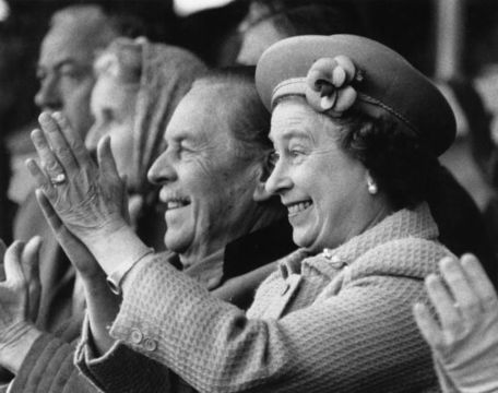 Queen Elizabeth II applauds enthusiastically as her husband, Prince Philip, the Duke of Edinburgh, tackles the obstacle course for coaches at the Royal Windsor Horse Show. (Photo by Keystone/Getty Images)