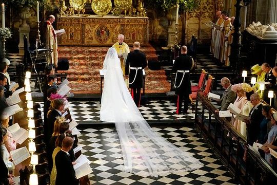  Prince Harry and Meghan Markle during their wedding ceremony in St George\'s Chapel at Windsor Castle on May 19, 2018 in Windsor, England. (Photo by Owen Humphreys - WPA Pool/Getty Images)