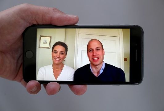 In this photo illustration Prince William, Duke of Cambridge and Catherine, Duchess of Cambridge speak to crisis volunteers on a video-call to mark the first anniversary of Shout85258 on May 15, 2020 in London, England. (Photo by Chris Jackson/Getty Images)