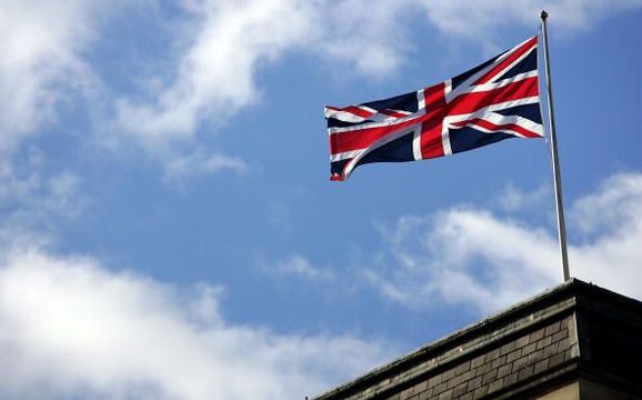 The Union Jack flies during Remembrance Sunday ceremonies on November 11, 2007 in London. Queen Elizabeth II led the Remembrance Sunday ceremony commemorations to remember the sacrifices made by Britain\'s war dead. (Photo by Gareth Cattermole/Getty Images)