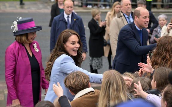 Prince William, Prince of Wales and Catherine, Princess of Wales greet the public during her visit to Carrickfergus Castle on October 06, 2022, in Belfast, Northern Ireland