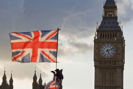 The Union Flag flying in front of Big Ben in London.