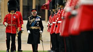 King Charles III presents colors to Irish guards, in absense of Kate Middleton
