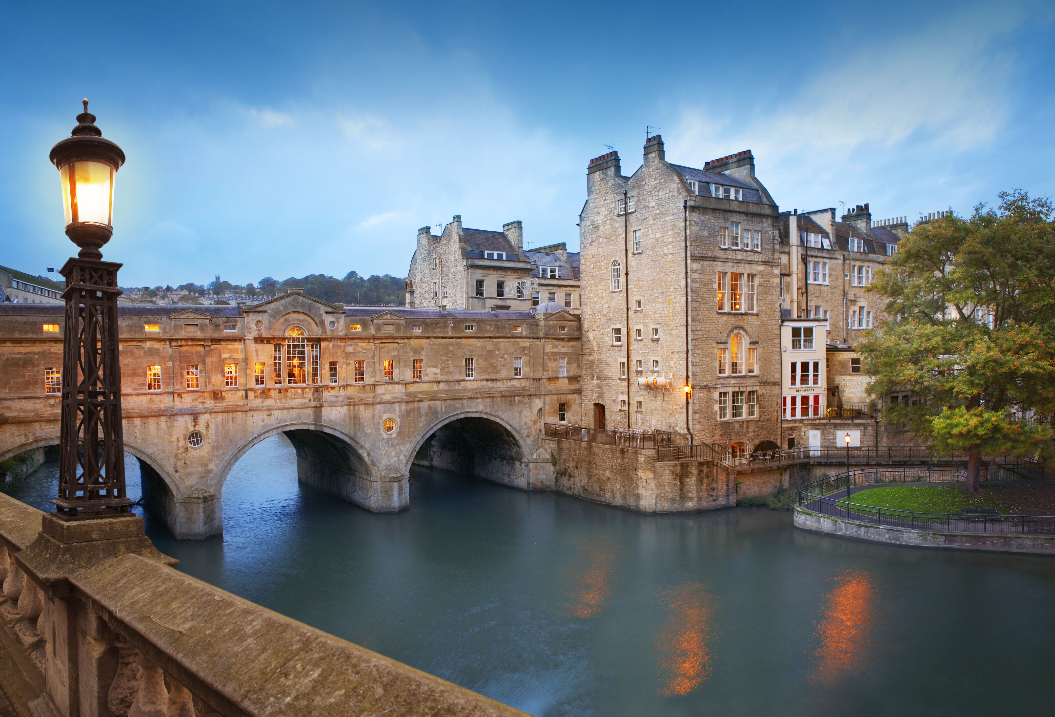 Pulteney Bridge by dusk, the main tourist attraction in Bath, UK.