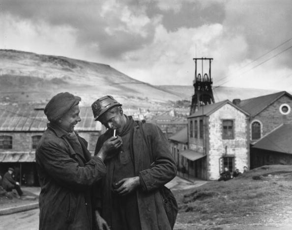 Miners enjoying a cigarette
