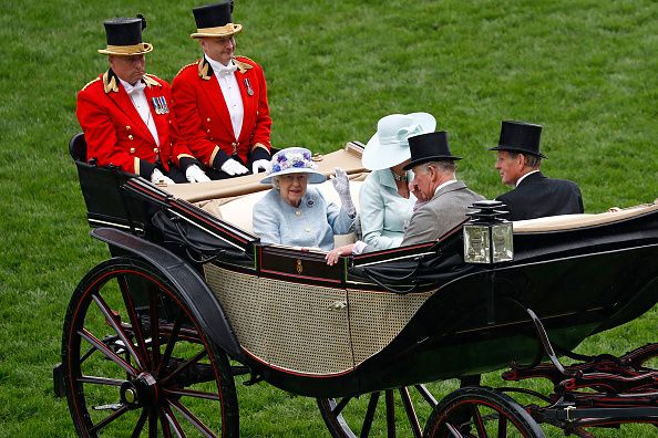 Queen Elizabeth II, Alan Brooke, 3rd Viscount Brookeborough, Prince Charles, Prince of Wales and Camilla, Duchess of Cornwall arrive in the Royal Procession seen from the Queen Anne Enclosure on day 2 of Royal Ascot at Ascot Racecourse