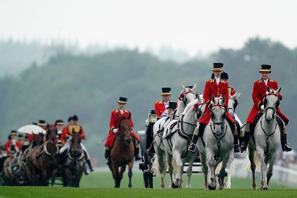 The Royal Procession makes its way down the track on day two of Royal Ascot at Ascot Racecourse