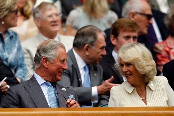 King Charles and Queen Camilla watch from the crowd King Charles and Queen Camilla watch from the crowd