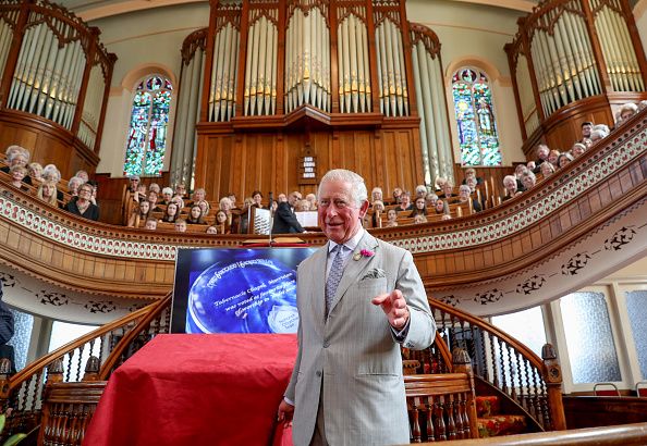 Prince Charles entertains guests at an event.