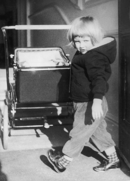 A young Lady Diana Spencer with a pram at Park House, Sandringham in Norfolk, 1964. (Photo by Central Press/Hulton Archive/Getty Images)