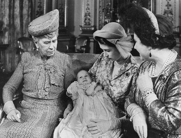 Four generations of the royal family gather as Princess Elizabeth, later Queen Elizabeth II of Great Britain holds her baby daughter Anne with her mother Queen Elizabeth (right) and her grandmother, Queen Mary.