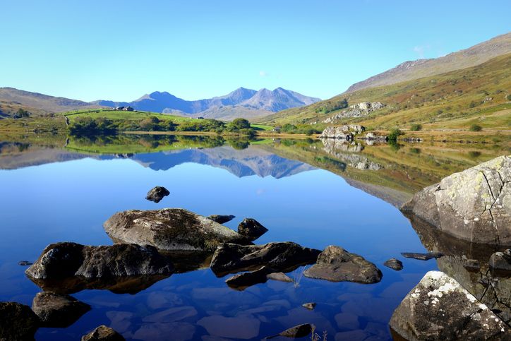 The view across Llynau Mymbyr to Snowdon on a beautiful still Autumn day.