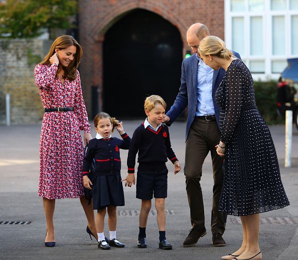 Helen Haslem (right), head of the lower school greets Princess Charlotte as she arrives for her first day of school, with her brother Prince George and her parents the Duke and Duchess of Cambridge, at Thomas's Battersea in London on September 5, 2019 in London, England. (Photo by Aaron Chown - WPA Pool/Getty Images)