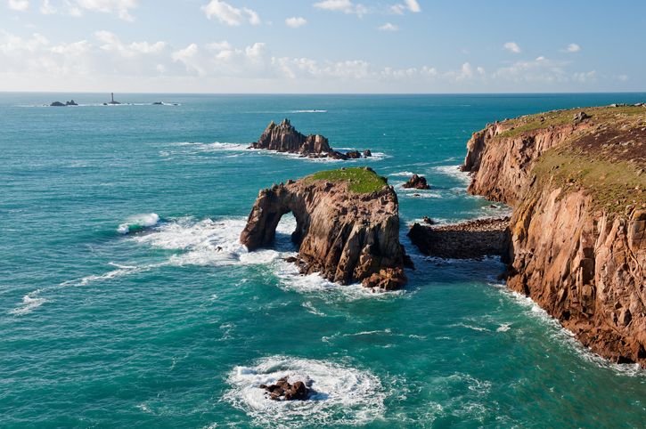 A wide angle view of the dramatic cliffs and rocks of Lands End, Cornwall, England