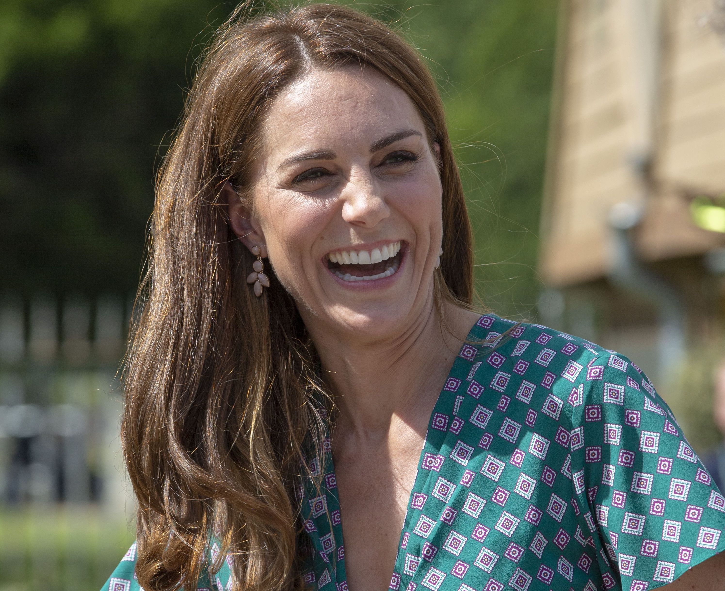 Catherine, Duchess of Cambridge visits the Hampton Court Flower Festival with children from Hampton Hill junior school at Hampton Court Palace.