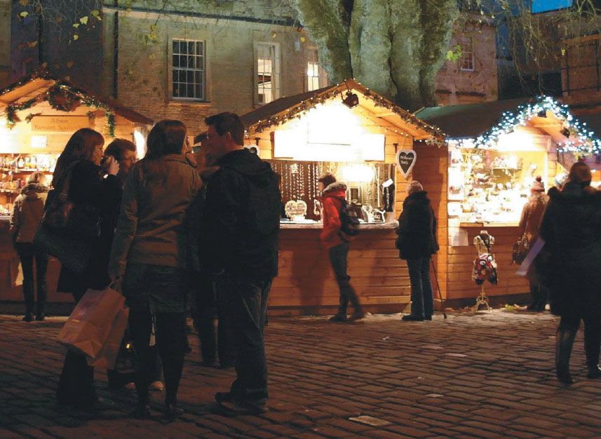 Market stalls spill down the street to Abbey Green in front of the popular Crystal Palace pub. Market stalls spill down the street to Abbey Green in front of the popular Crystal Palace pub.