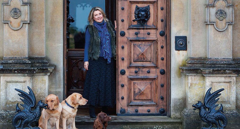 Lady Carnarvon with three of her family's seven dogs. Lady Carnarvon with three of her family's seven dogs.