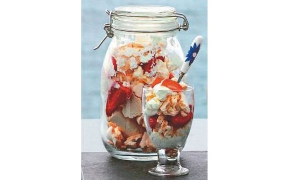 A melange of meringue, whipped cream and berries, Eton Mess can grace any picnic container. A melange of meringue, whipped cream and berries, Eton Mess can grace any picnic container.